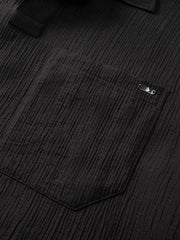 Men's Solid Textured Jacquard Polo Shirt