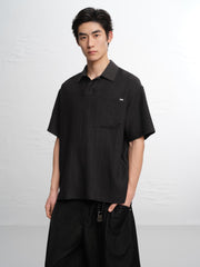 Men's Solid Textured Jacquard Polo Shirt