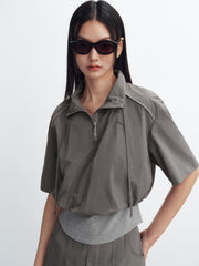 Women's cinched waist half-placket slim-fit top