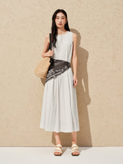 Women's white sleeveless dress with a scarf