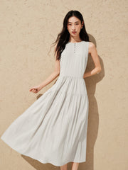 Women's white sleeveless dress with a scarf