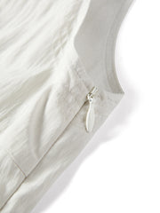 Women's white sleeveless dress with a scarf