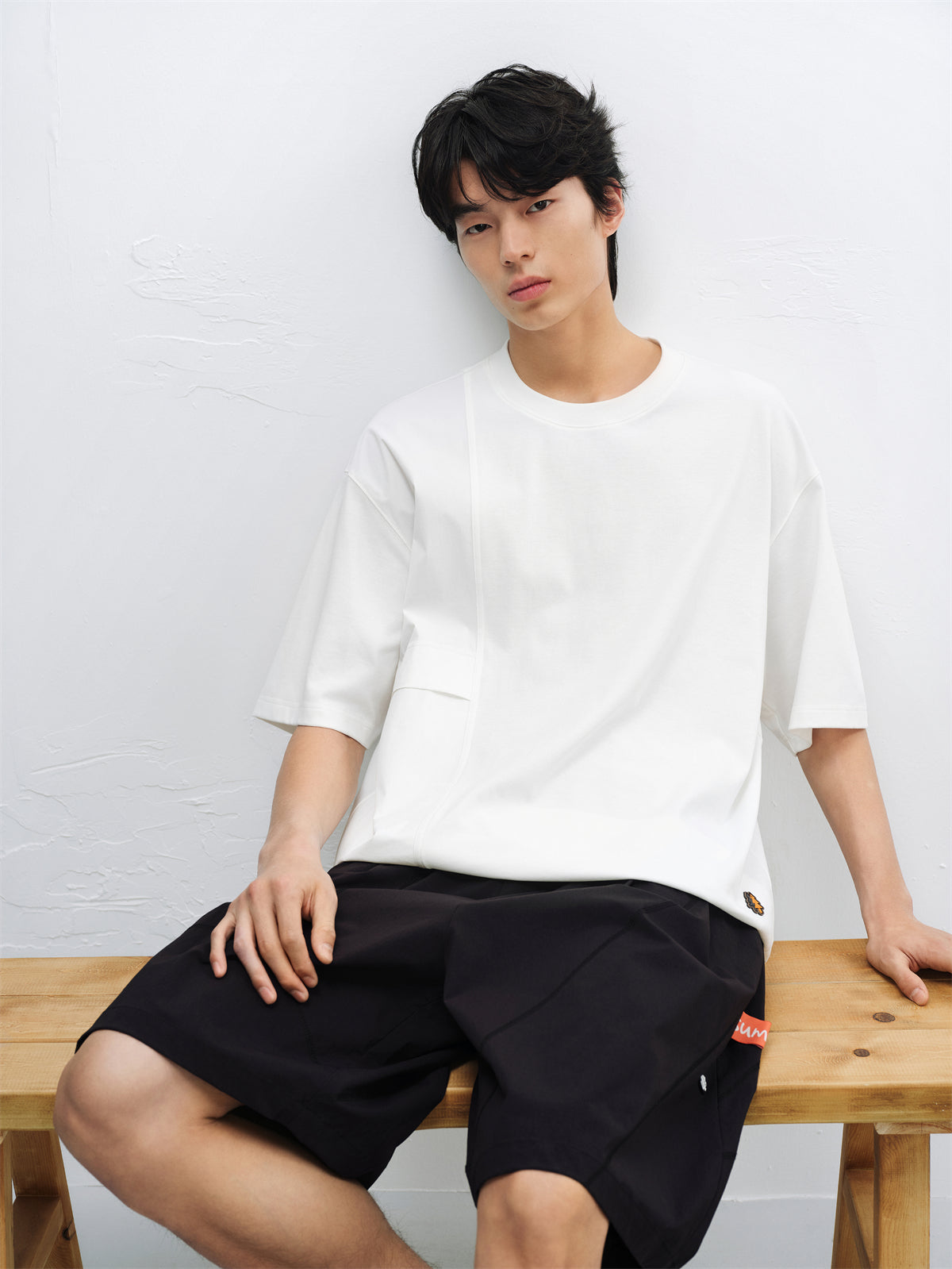 Men's Solid Panelled T-Shirt with Mini Badge