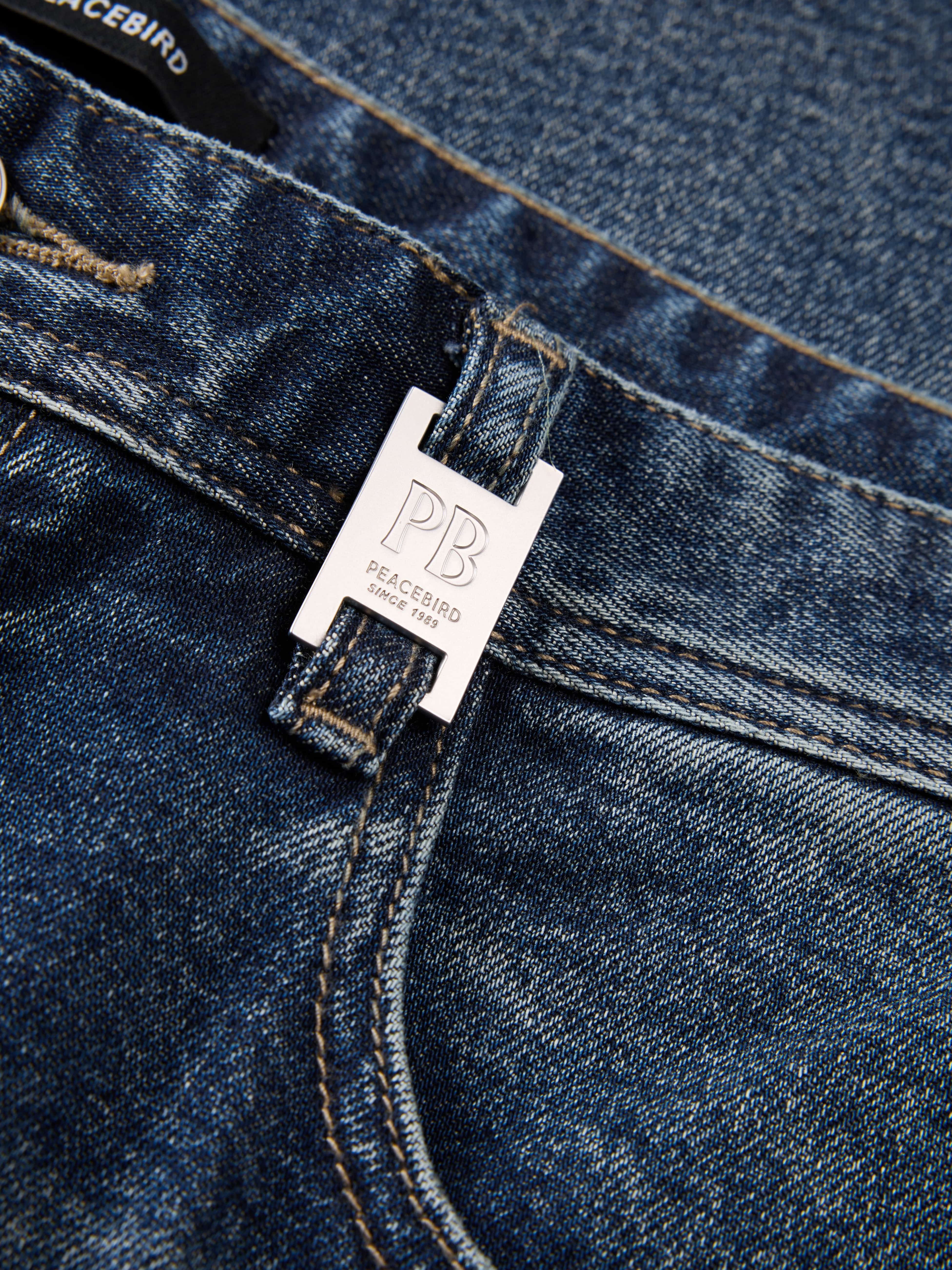 Men's Distressed Tapered Jeans with Pocket Detail