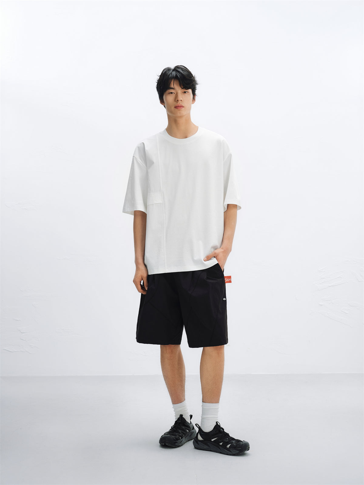 Men's Solid Panelled T-Shirt with Mini Badge